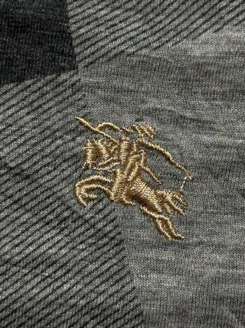 3rd:- Burberry polo